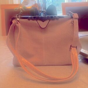 Beautiful vintage style handbag in pink . New